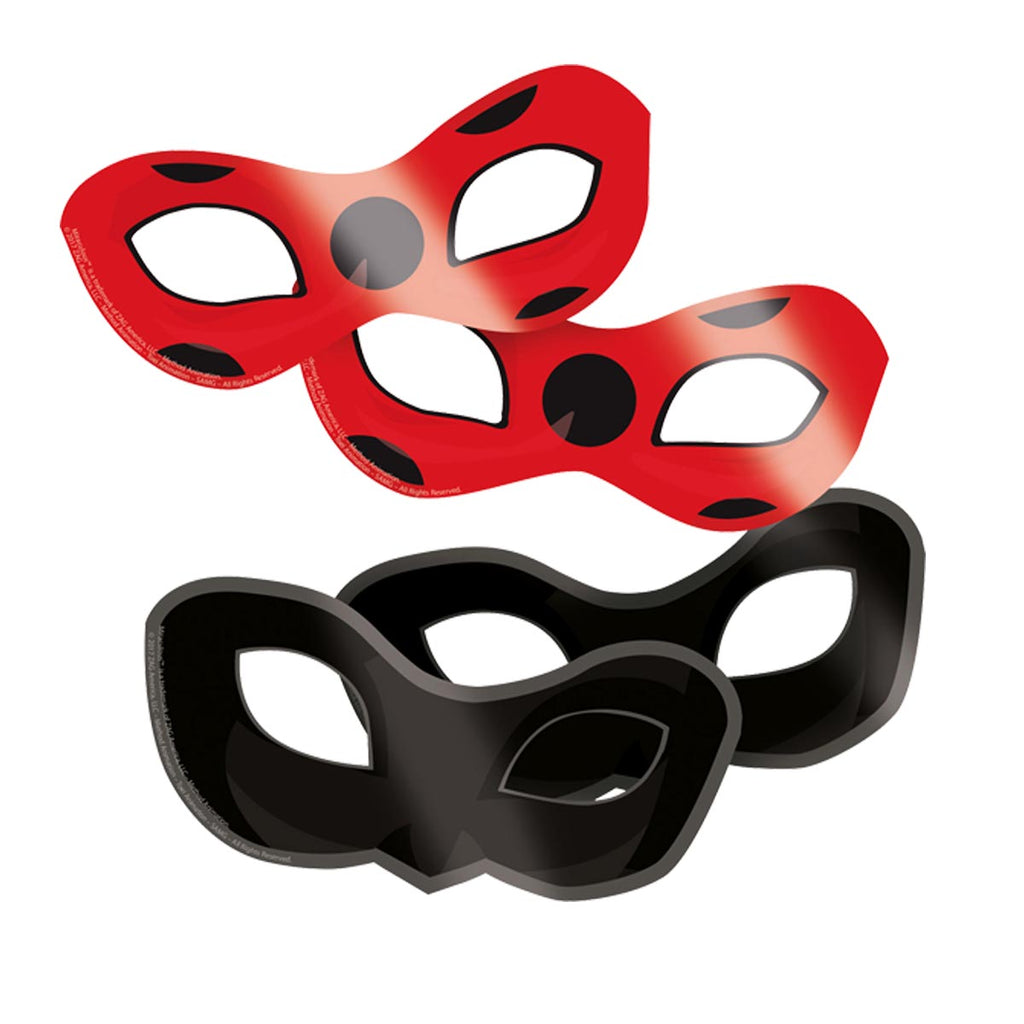 Zwei rote Augenmasken mit schwarzen Punkten und zwei schwarze Augenmasken